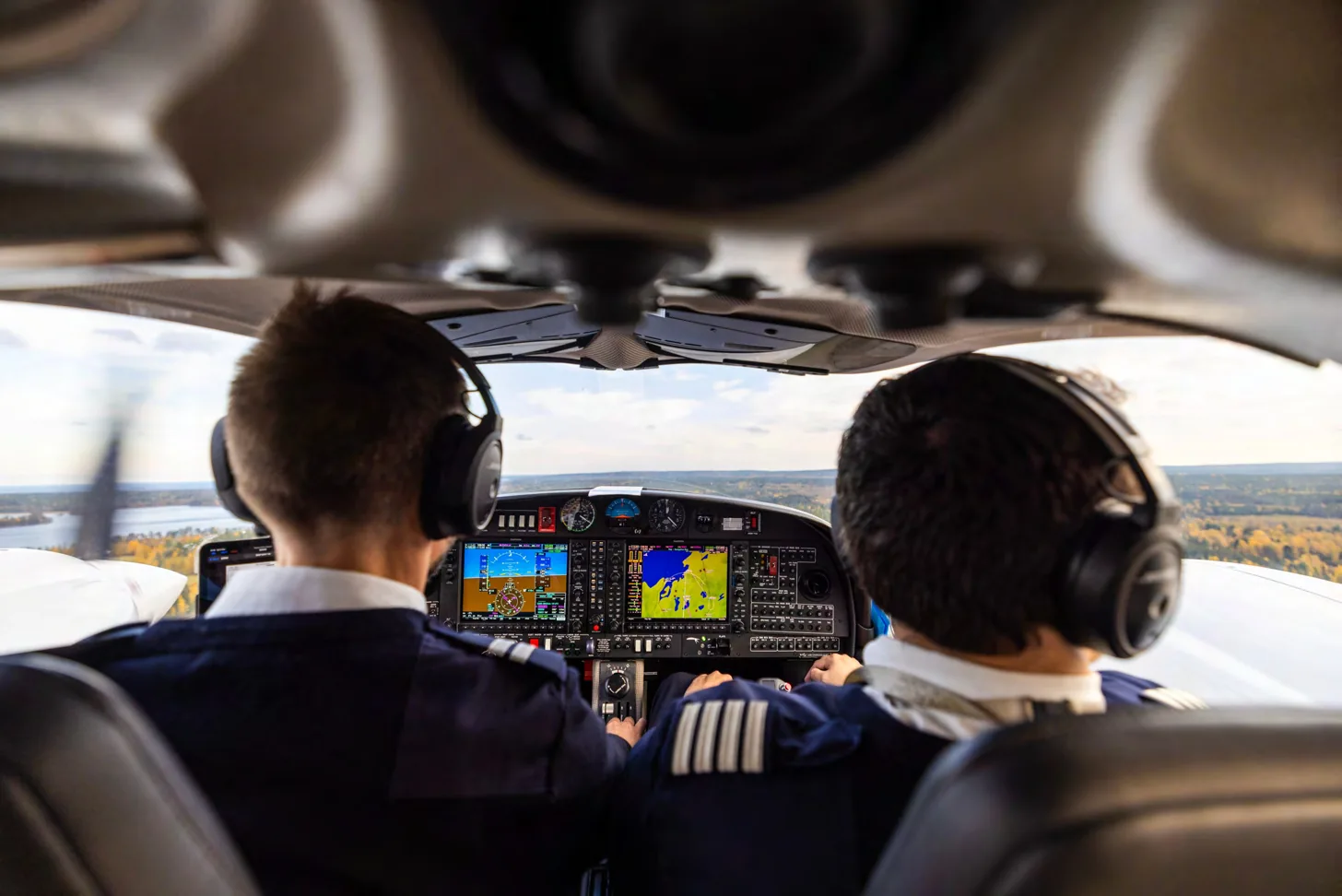 Pilots training in an aircraft cockpit